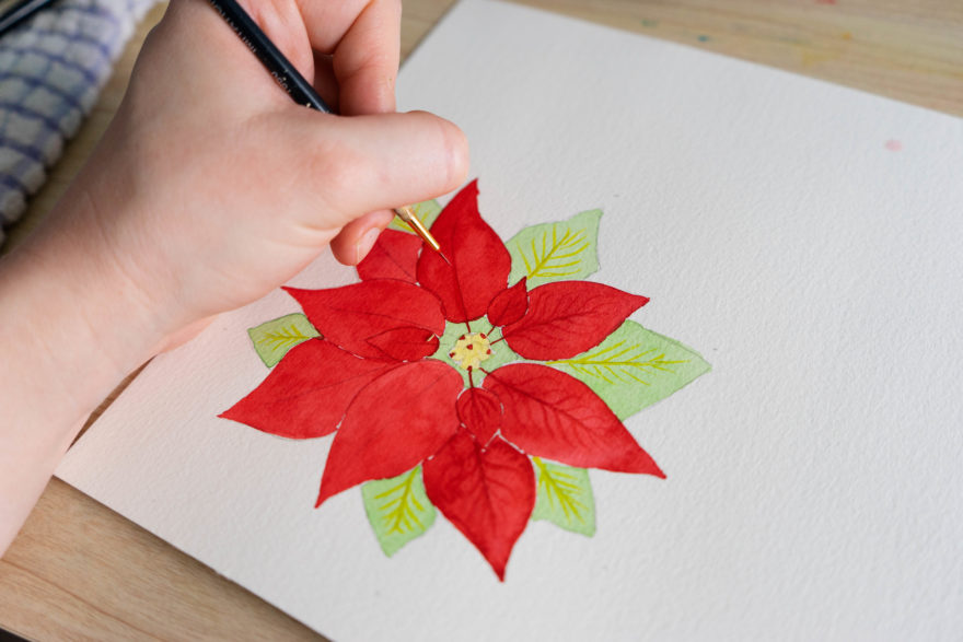 Painting in the finer details of the flower petals